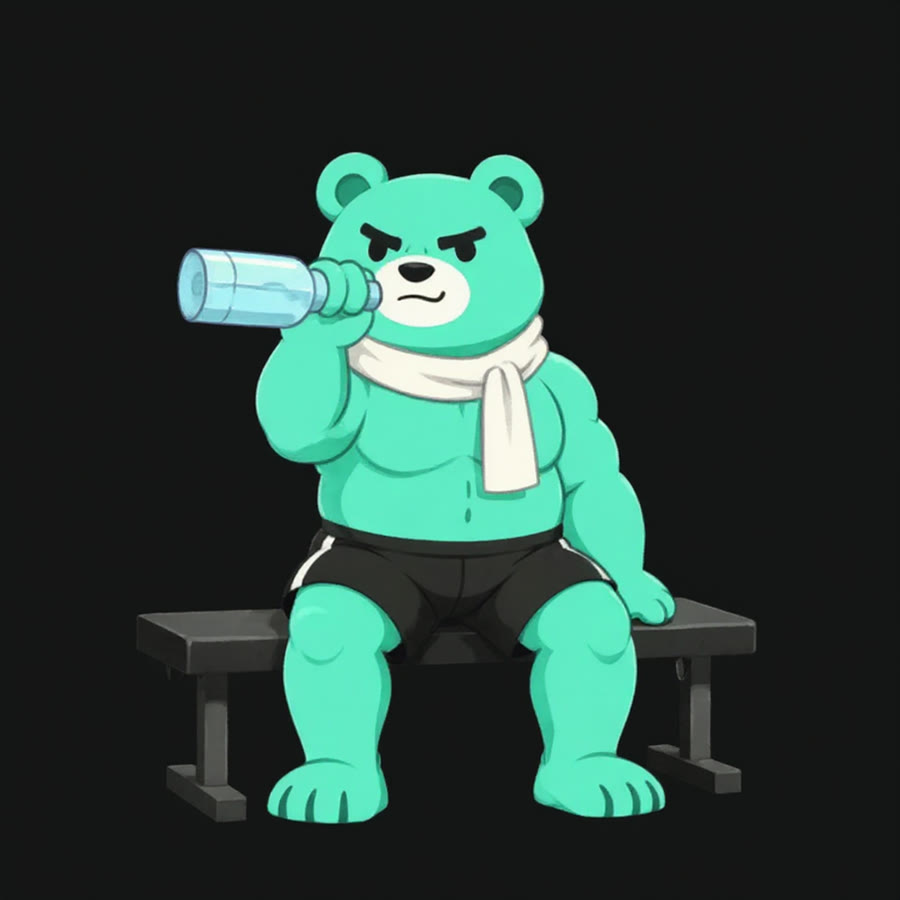 Buddy the bear resting on a bench with a towel and water bottle